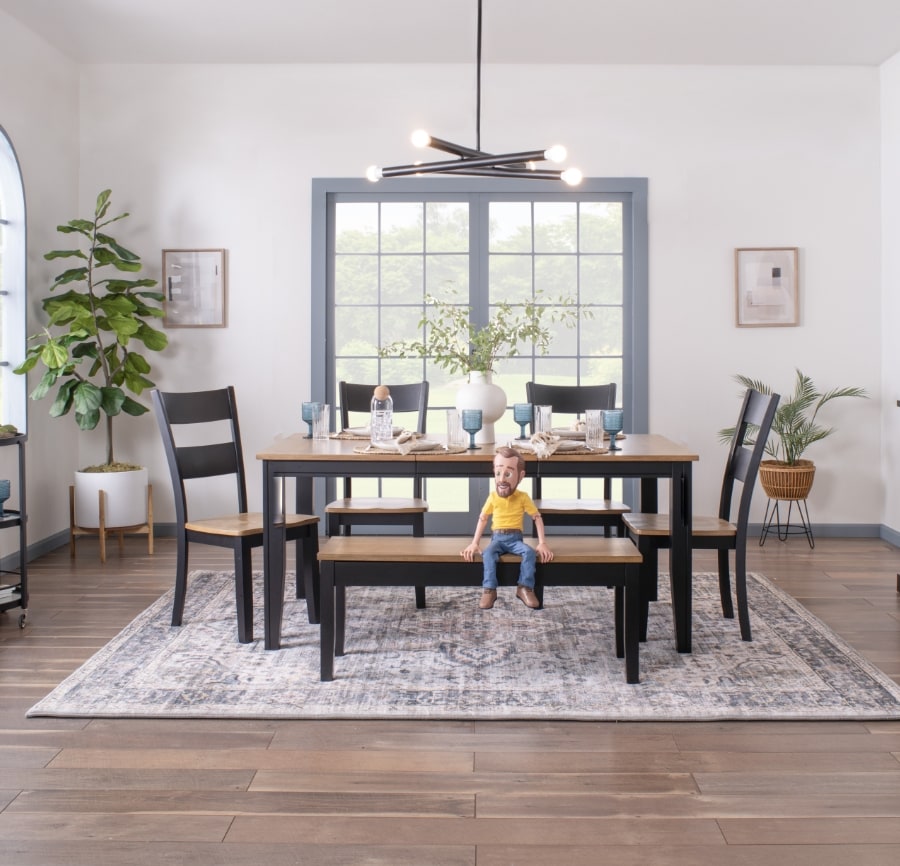 Dining room with white and brown rectangular dining room table with 6 white and brown ladder back dining chairs.